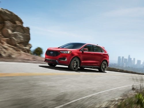 2024 Ford Edge driving around a curve